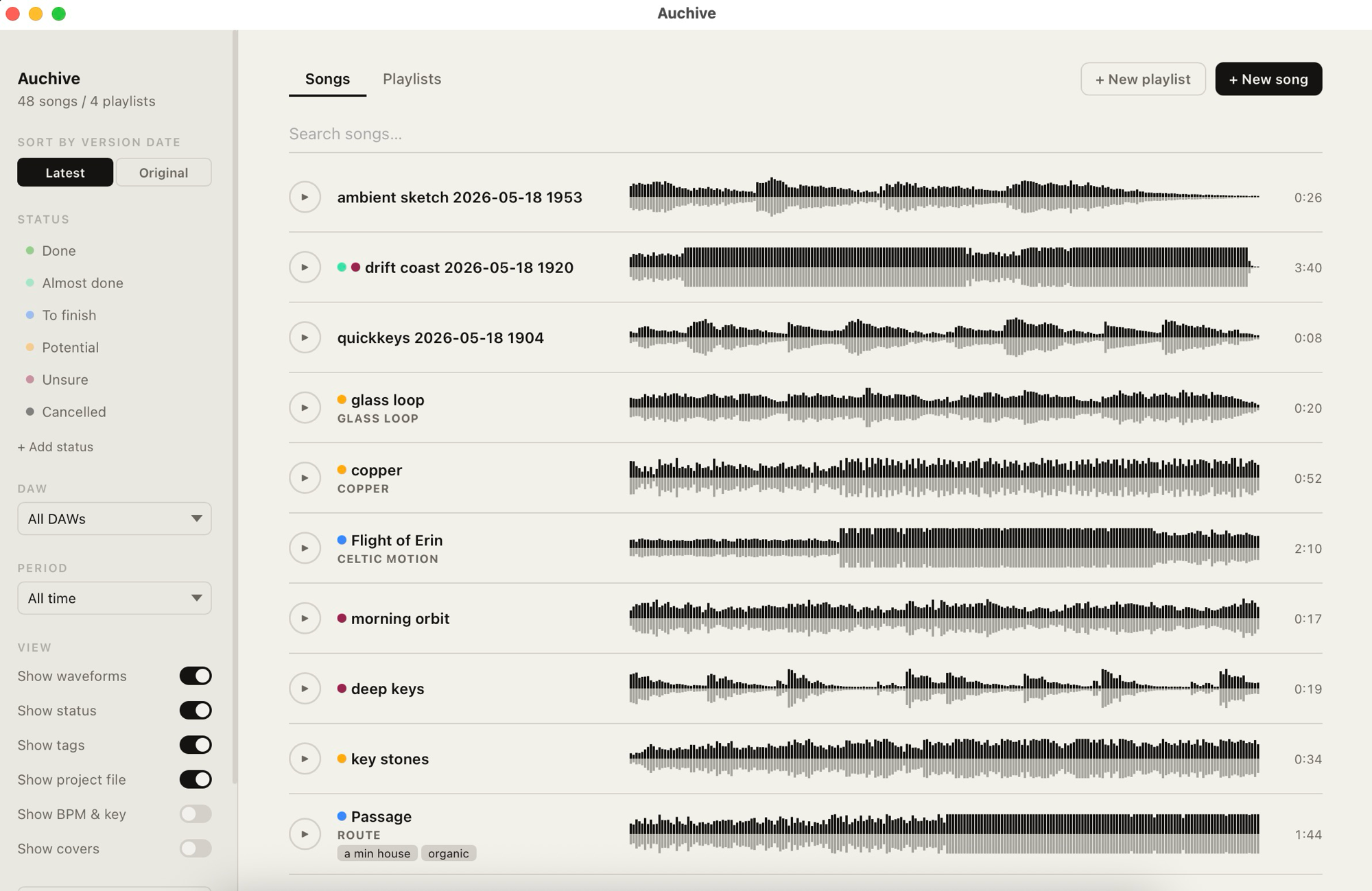 Auchive — music project manager showing a list of tracks with waveforms, status tags, and filters
